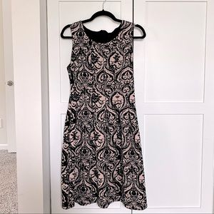 Dusty pink and black velvet fit and flare dress